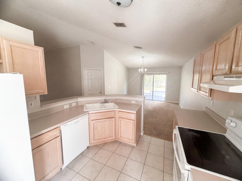 Check out 262 SW Panther Trce, a residence recently enhanced - photo 19