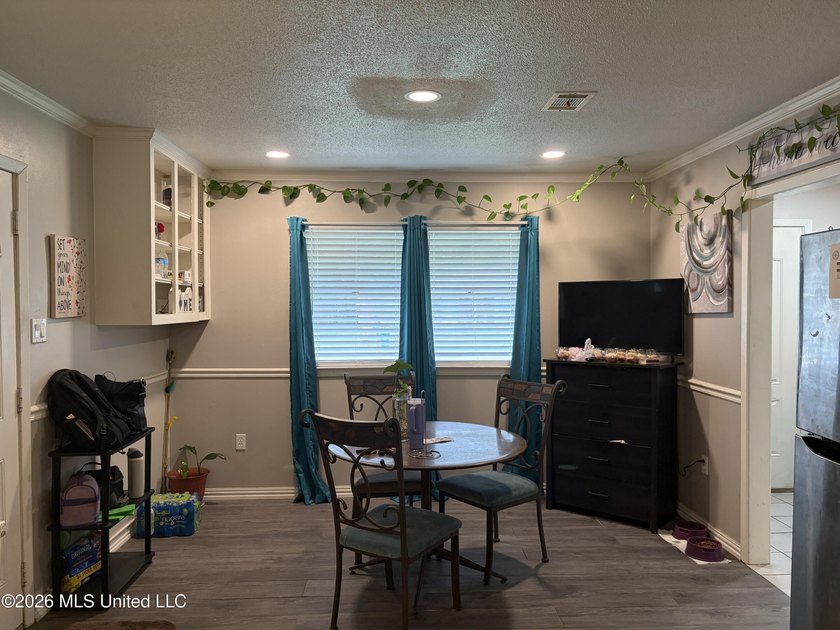 Recent upgrades include ceramic tile flooring throughout, HVAC - photo 4