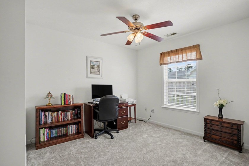 This beautifully maintained home in Highland Woods showcases - photo 26