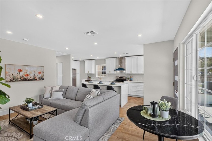 Why settle for a remodel when you can own a home that's been - photo 7