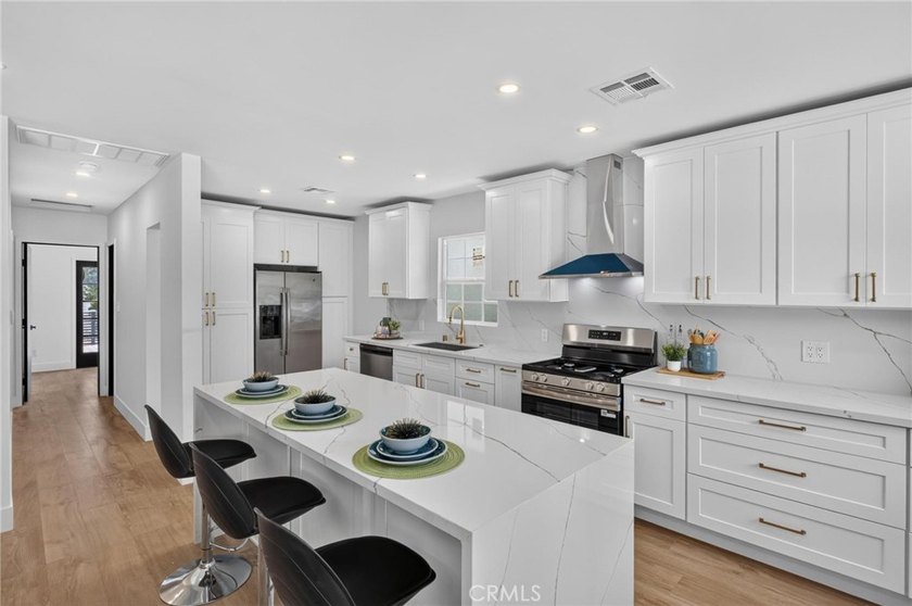 Why settle for a remodel when you can own a home that's been - photo 9
