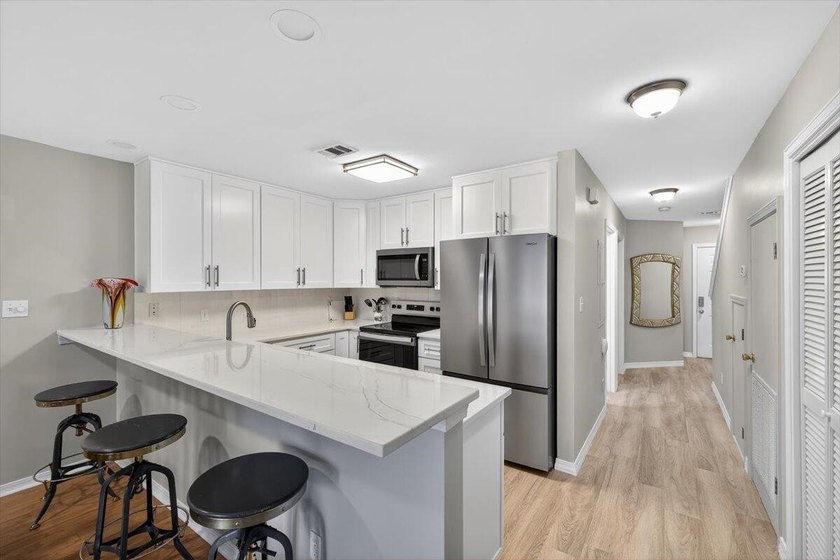 Nestled within Seascape Resort, this 3BR/3BA residence captures - photo 12