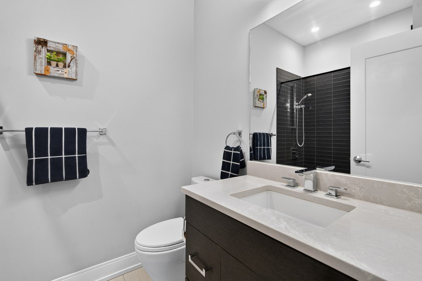 Luxury living awaits in this exceptional 3-bedroom, 2-bath top - photo 19