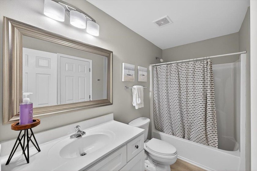 Nestled within Seascape Resort, this 3BR/3BA residence captures - photo 26
