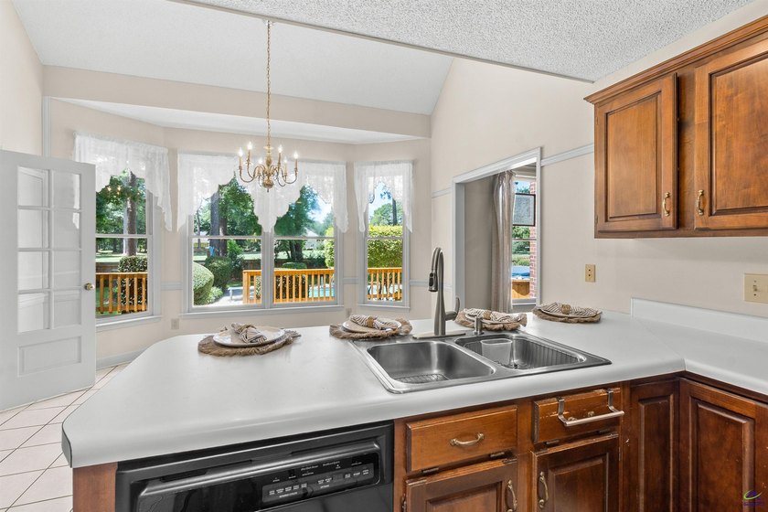 Welcome to this beautifully maintained brick home offering over - photo 28
