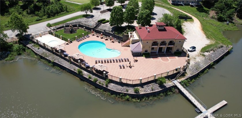 Escape to the resort-style living of Porto Cima. This 0.61-acre - photo 13