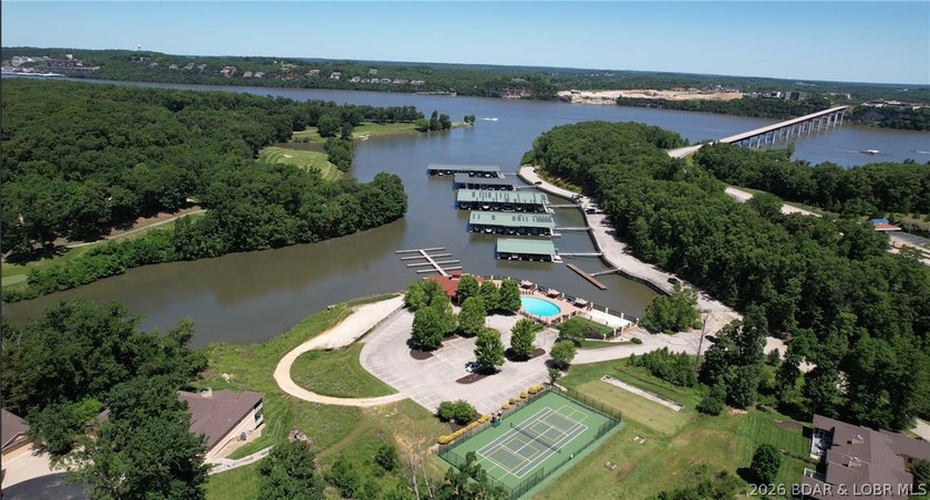 Escape to the resort-style living of Porto Cima. This 0.61-acre - photo 14