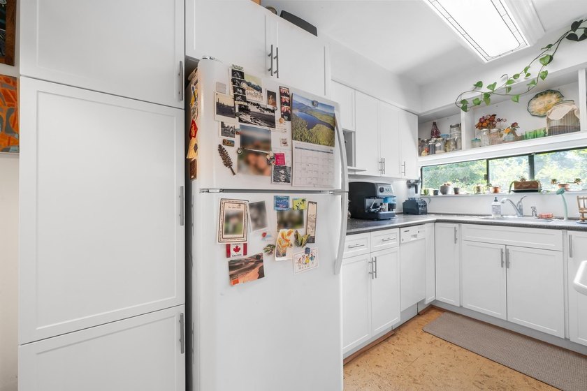 Welcome to Sunset West, a beautifully updated corner residence - photo 9