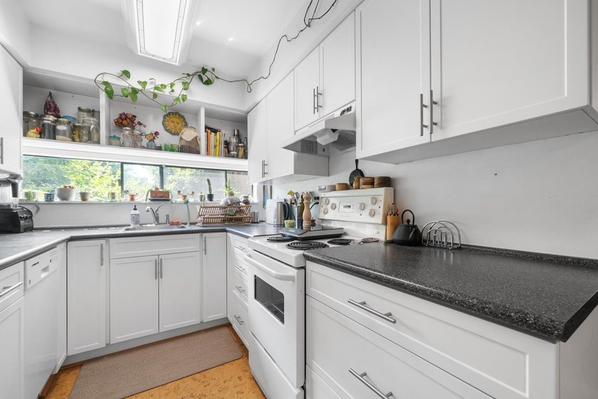 Welcome to Sunset West, a beautifully updated corner residence - photo 10