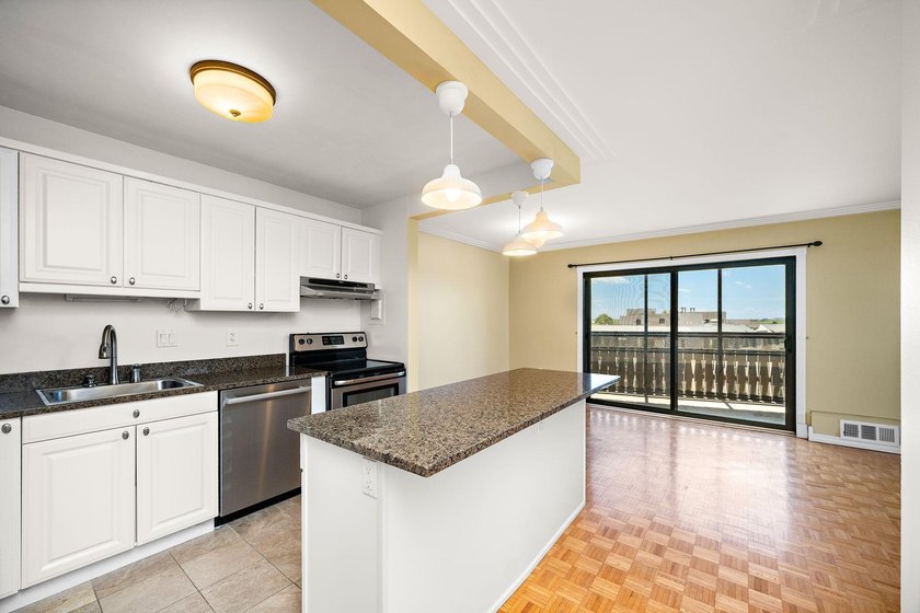 Highly sought after *09* corner unit features 2 bedrooms, 1 bath - photo 7