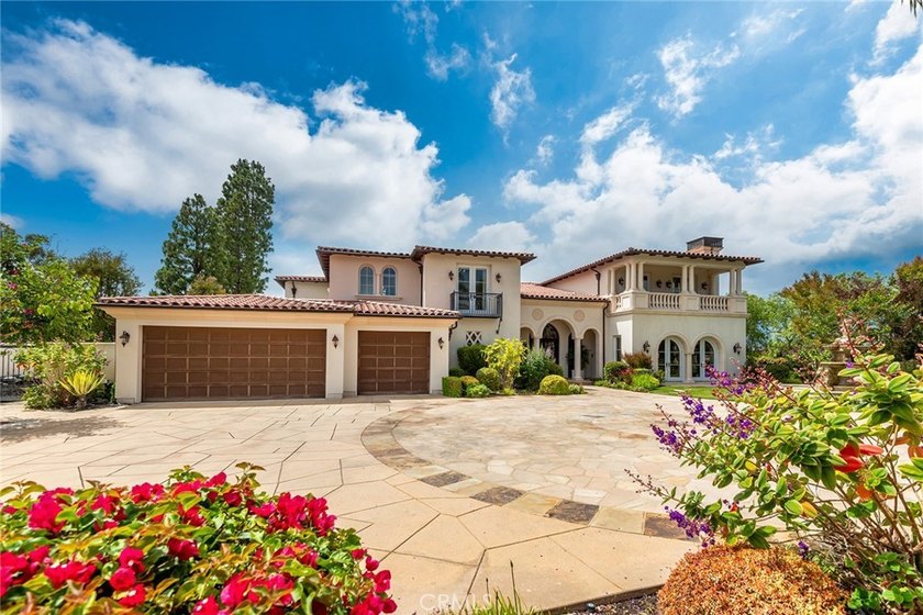 This ultra-private, gated custom estate offers a rare - photo 2