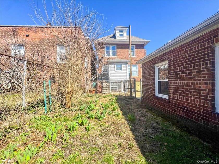 Welcome to 2021 Haight Avenue, a detached brick two family home - photo 22