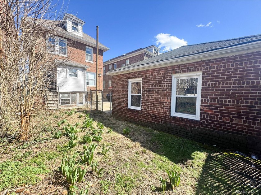 Welcome to 2021 Haight Avenue, a detached brick two family home - photo 23