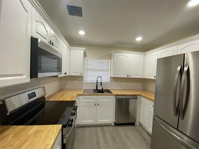 AVAILABLE FOR IMMEDIATE SALE - Updated 4-bedroom, 2-bath - photo 4