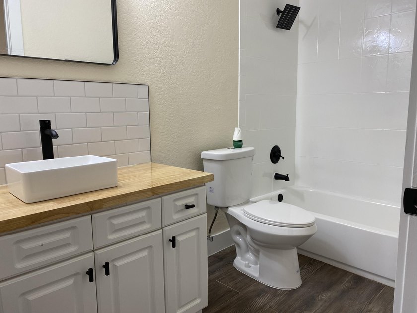 AVAILABLE FOR IMMEDIATE SALE - Updated 4-bedroom, 2-bath - photo 7