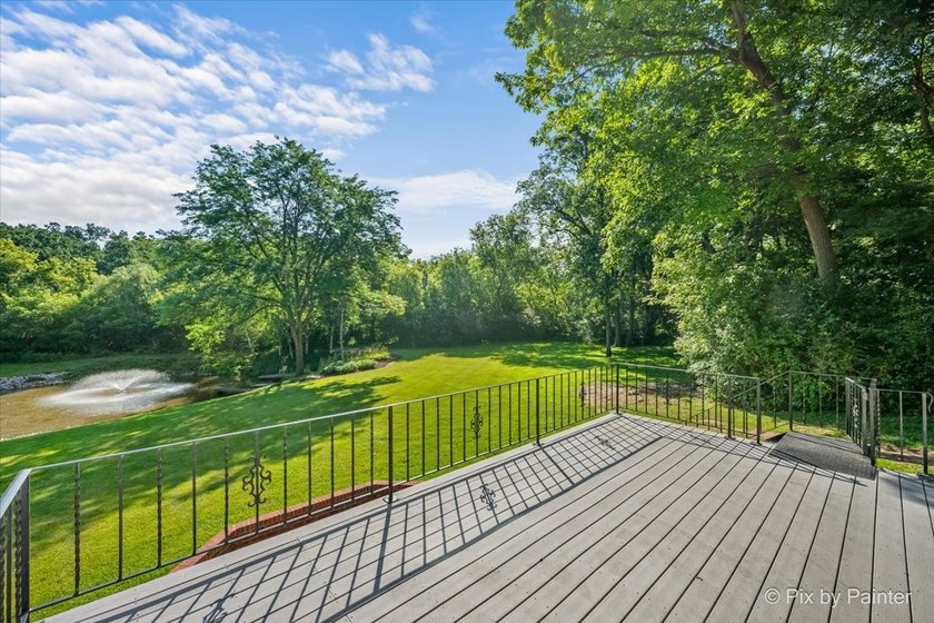 A PRIVATE 3.5-ACRE RETREAT with a STOCKED POND, FOUNTAIN, and - photo 33