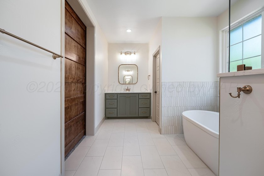 Welcome to this stunning new construction home featuring luxury - photo 33