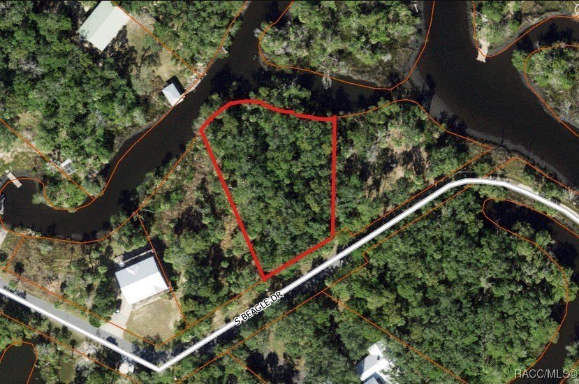 Build where others vacation! This .57-acre wooded waterfront - photo 5