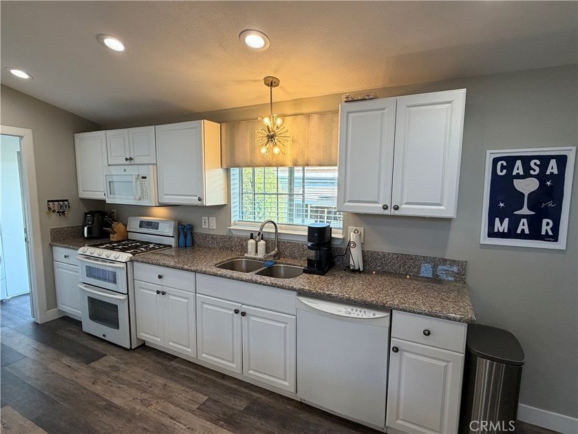 Beautiful, clean and move in ready. This 3 bedroom, 2 bth., Surf - photo 7
