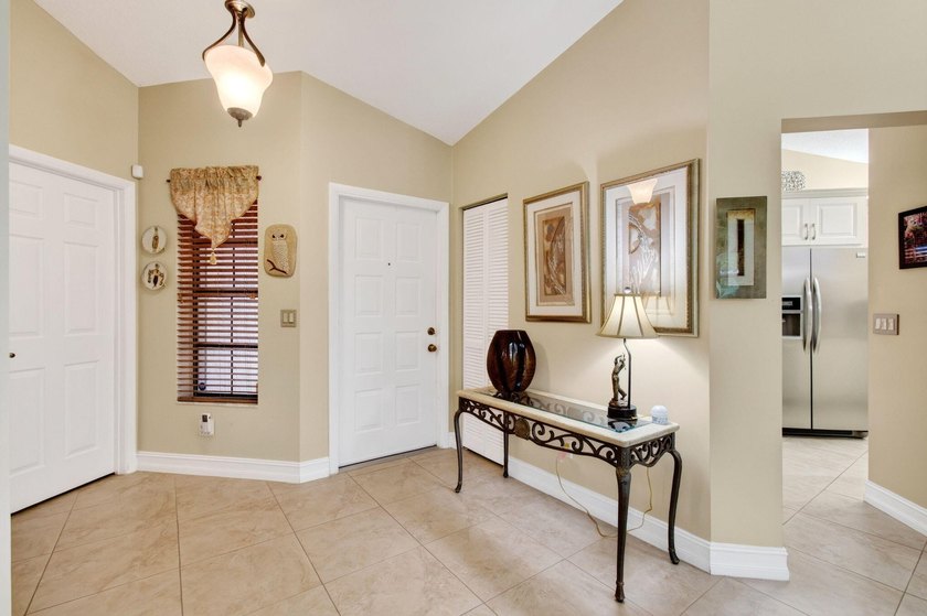 Enjoy breathtaking lake views from this beautifully maintained - photo 3