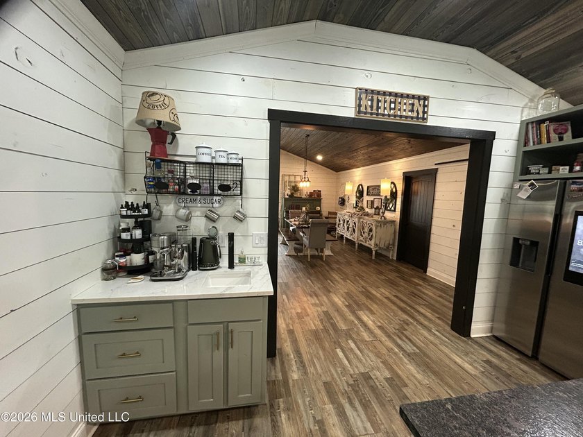 Welcome to this charming 3-bedroom, 2-bath farmhouse retreat - photo 7