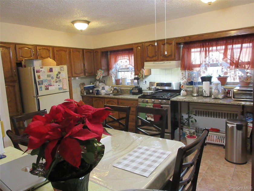 Well-maintained attached brick single- family home located in - photo 4
