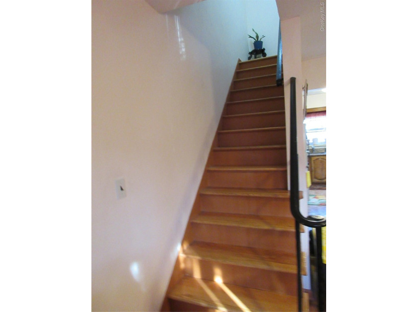Well-maintained attached brick single- family home located in - photo 6
