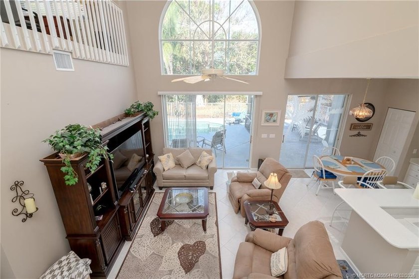 NEW ROOF! NEW PRICE! This Ballantrae Pool Home offers 3 bedrooms - photo 18