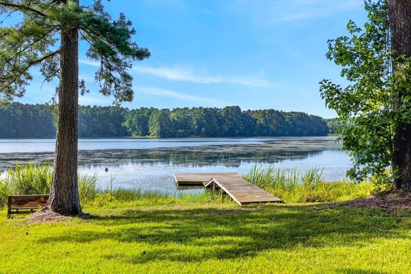 Discover the beauty of waterfront living on Lake Pinkston in - photo 25