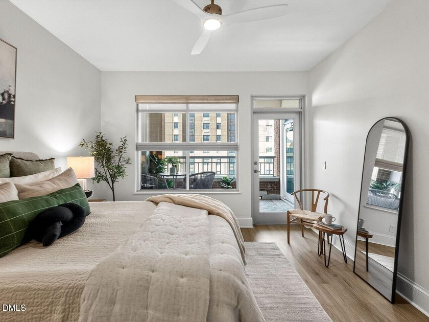 Experience elevated downtown living from this beautifully - photo 24
