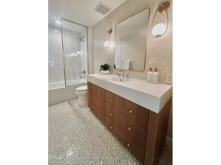Experience elevated downtown living from this beautifully - photo 27