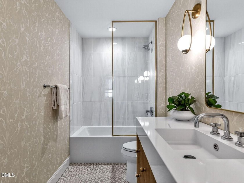 Experience elevated downtown living from this beautifully - photo 28