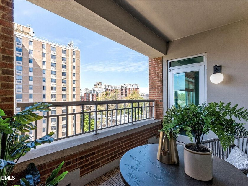 Experience elevated downtown living from this beautifully - photo 32