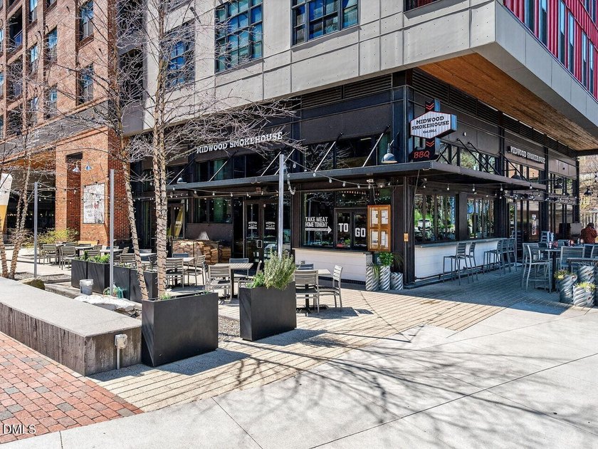 Experience elevated downtown living from this beautifully - photo 45