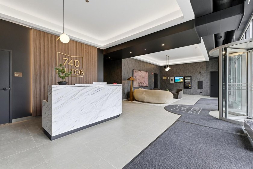 Experience elevated city living in this well-maintained - photo 12