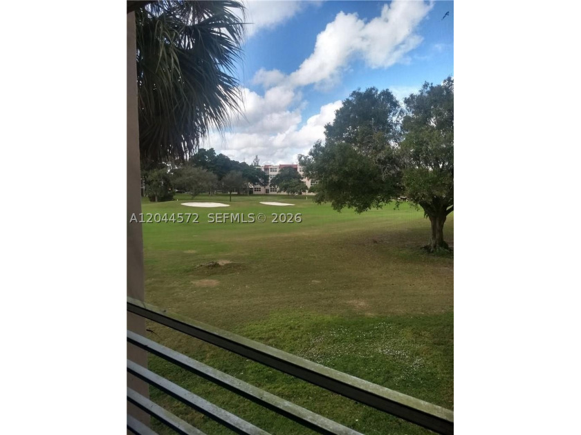 Rarely available corner unit in prestigious Pine Island Ridge - photo 3