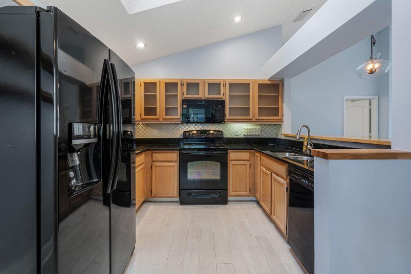 Welcome home to this 3-bedroom, 2-bathroom waterfront home in - photo 11