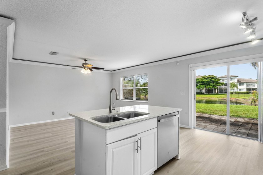 Welcome to 3260 Commodore Court, a beautifully renovated lake - photo 12
