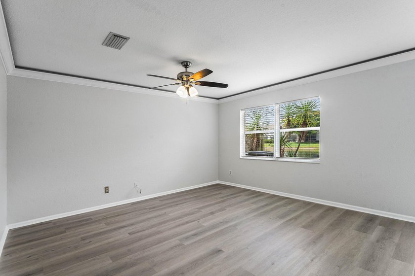 Welcome to 3260 Commodore Court, a beautifully renovated lake - photo 13