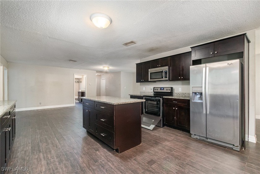 Spacious three-bedroom, two-bathroom home with a two-car garage - photo 9