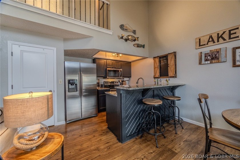 Welcome to 14 Bentwood Dr at the 3 Mile Marker of the Lake of - photo 14