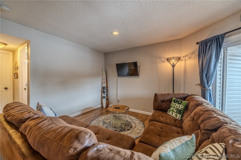 Welcome to 14 Bentwood Dr at the 3 Mile Marker of the Lake of - photo 18