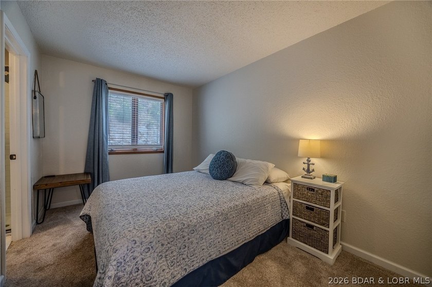 Welcome to 14 Bentwood Dr at the 3 Mile Marker of the Lake of - photo 24