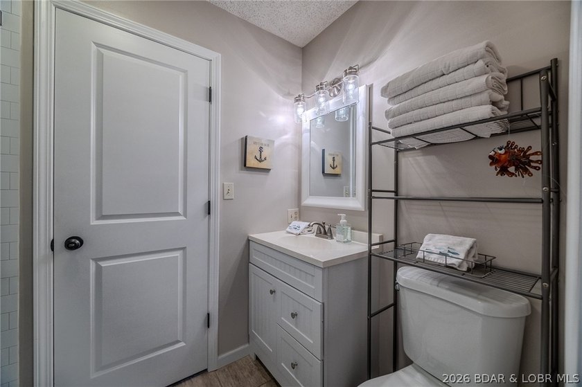 Welcome to 14 Bentwood Dr at the 3 Mile Marker of the Lake of - photo 33