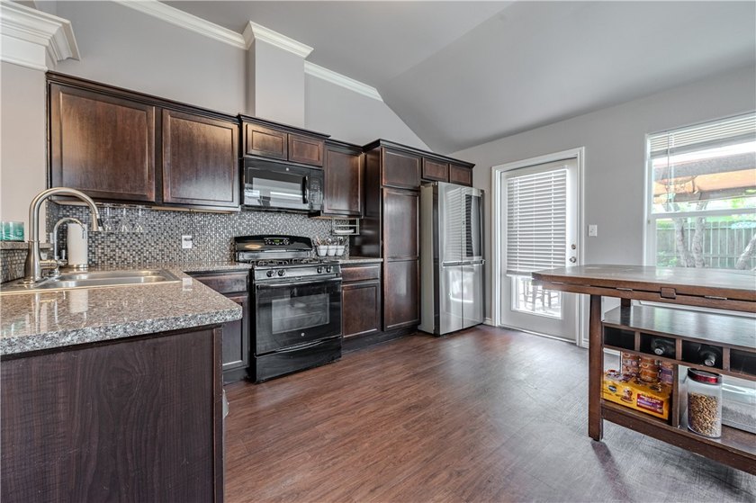 Charming and well-maintained home featuring an inviting - photo 12