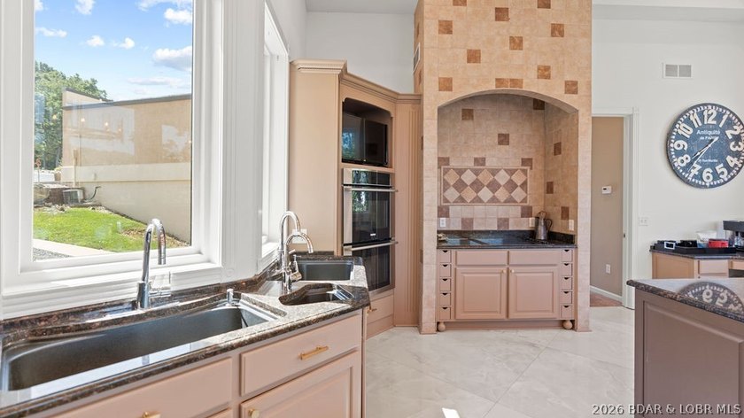 Luxury lakefront home located in a highly sought-after cove at - photo 16