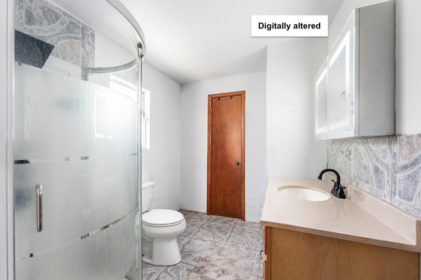 4BR/2BA single-family home with 1,707 sq. ft. under air. This - photo 7