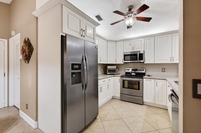 Enjoy breathtaking lake views from this beautifully maintained - photo 15