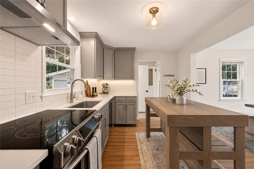 OVER $80K IN RECENT UPDATES! Beautifully renovated inside and - photo 12