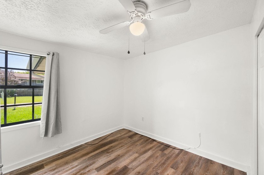 Welcome home to this updated 2-bedroom, 1-bathroom residence in - photo 11